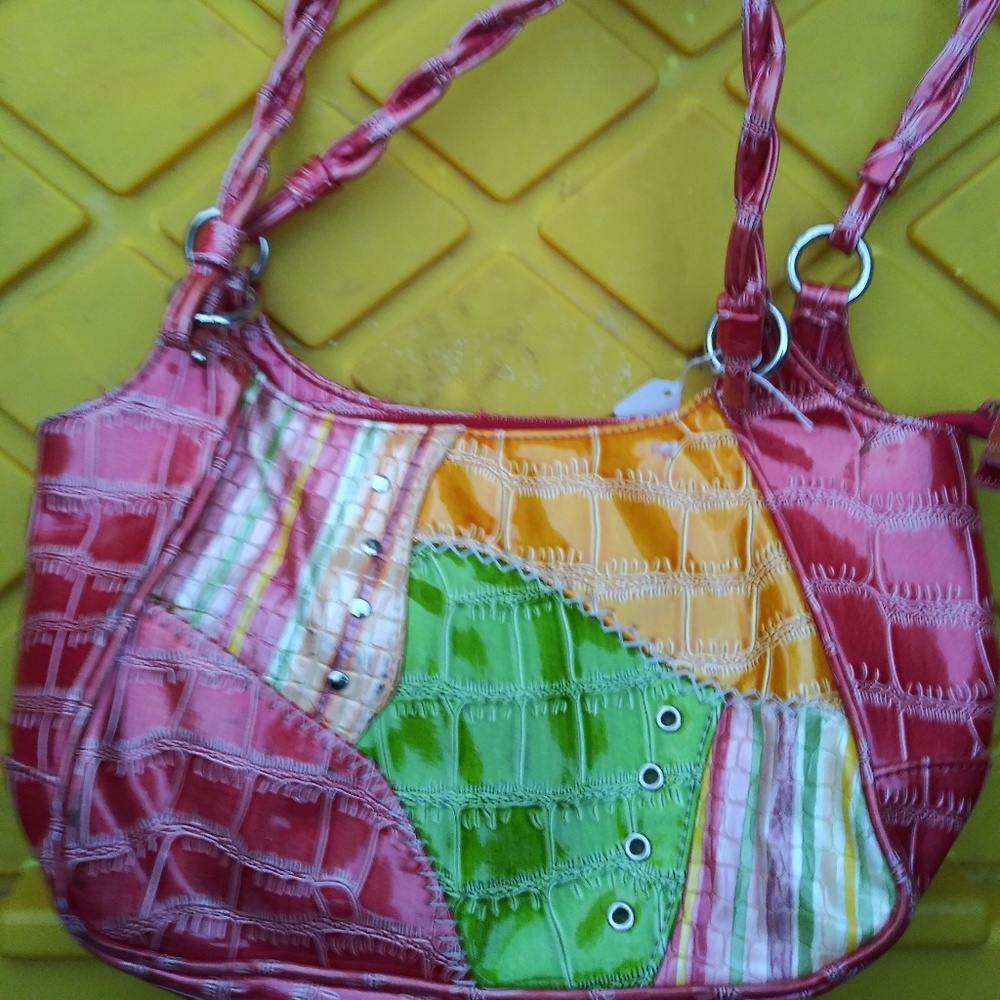 Three shiny leather purses...